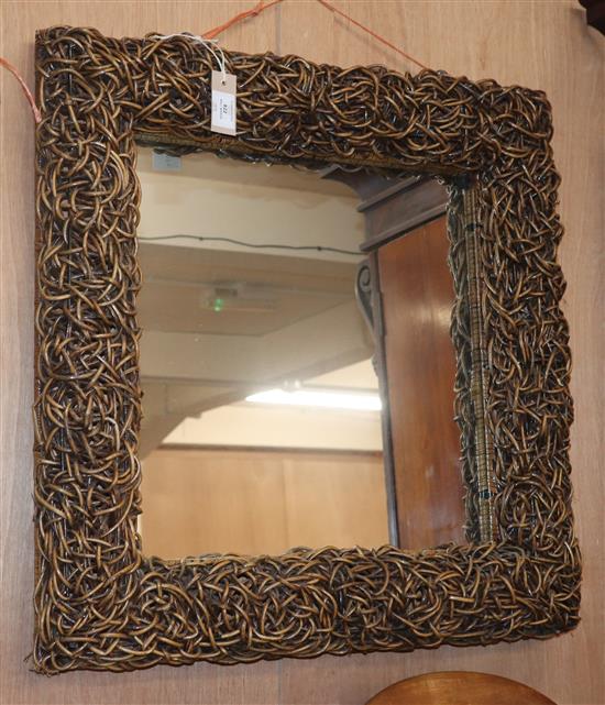 A contemporary wall mirror W.68cm